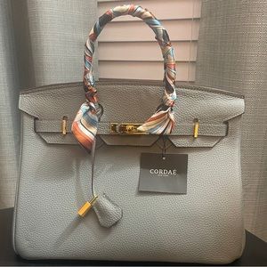 NWT! Cordae 35” Genuine Leather Handbag. Free shipping.